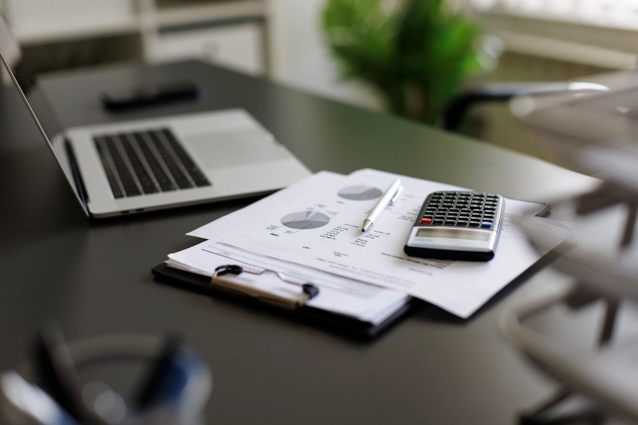 Financial documents and office workspace representing accounting services